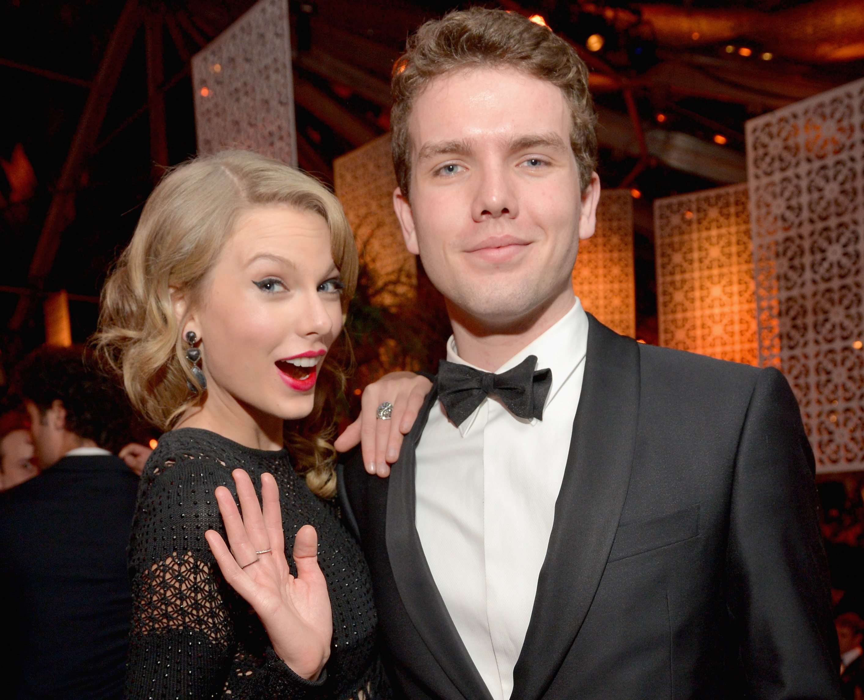 BEVERLY HILLS, CA - JANUARY 12: Singer Taylor Swift (L) and Austin Swift attend The Weinstein Company & Netflix's 2014 Golden Globes After Party presented by Bombardier, FIJI Water, Lexus, Laura Mercier, Marie Claire and Yucaipa Films at The Beverly Hilton Hotel on January 12, 2014 in Beverly Hills, California. (Photo by Charley Gallay/Getty Images for The Weinstein Company)