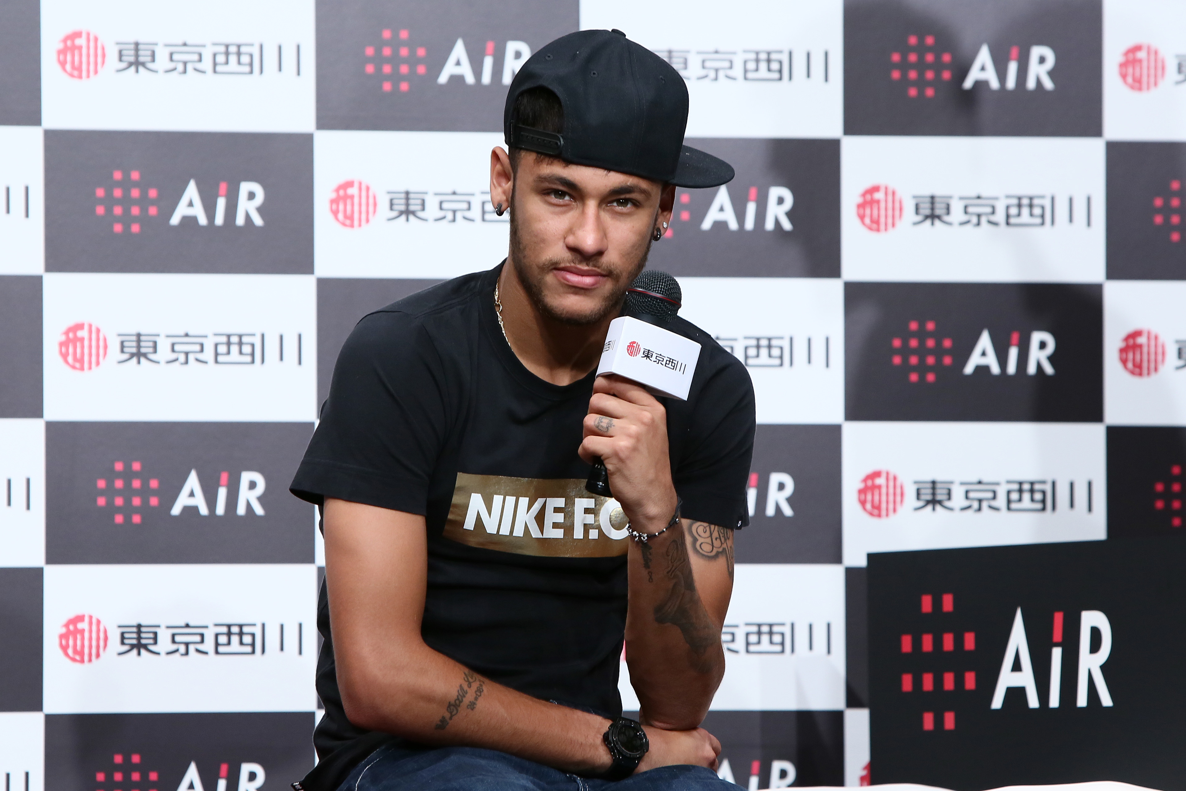 TOKYO, JAPAN - JULY 31:  Neymar da Silva Santos attends the press conference to announce the advertising contract with Nishikawa Sangyo Co. on July 31, 2014 in Tokyo, Japan. Neymar will appear in ads for Nishikawa's 'AiR' mattresses designed for athletes.  (Photo by Ken Ishii/Getty Images)