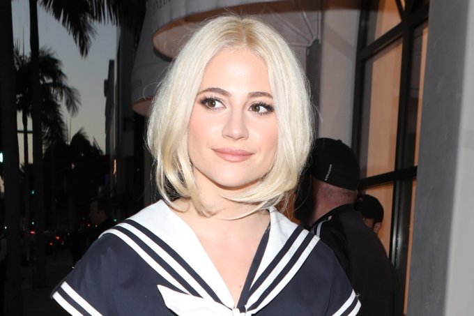 Pixie Lott looks chic in a sailor suit romper at the D&G Party