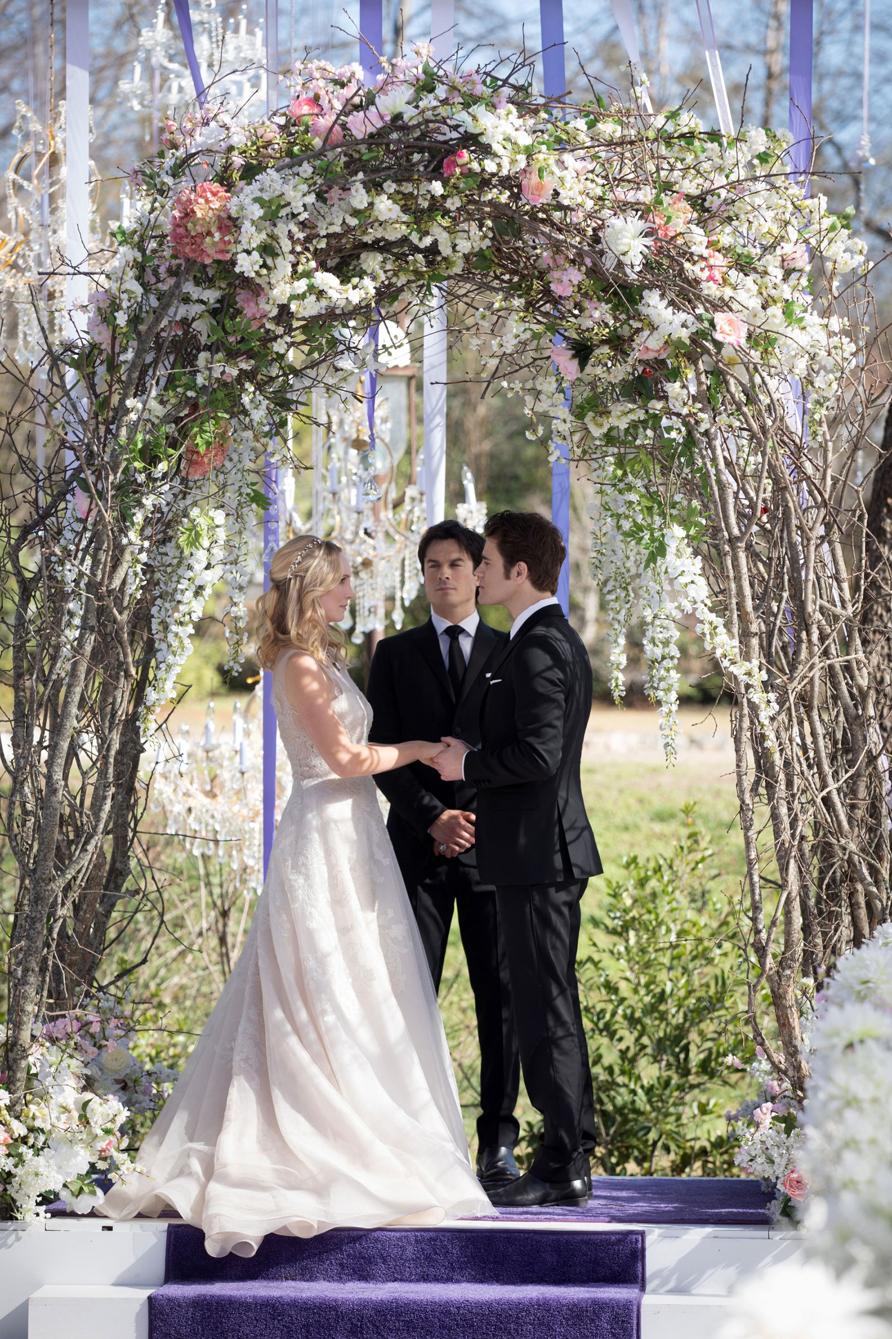 The Vampire Diaries -- "We're Planning a June Wedding" -- Image Number: VD815c_0121.jpg -- Pictured (L-R): Candice King as Caroline, Ian Somerhalder as Damon and Paul Wesley as Stefan -- Photo: Bob Mahoney/The CW -- ÃÂ© 2017 The CW Network, LLC. All Rights Reserved.