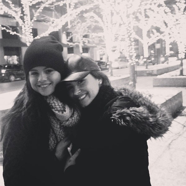 Selena Gomez and Demi Lovato in 2013 posing for a photo in black and white