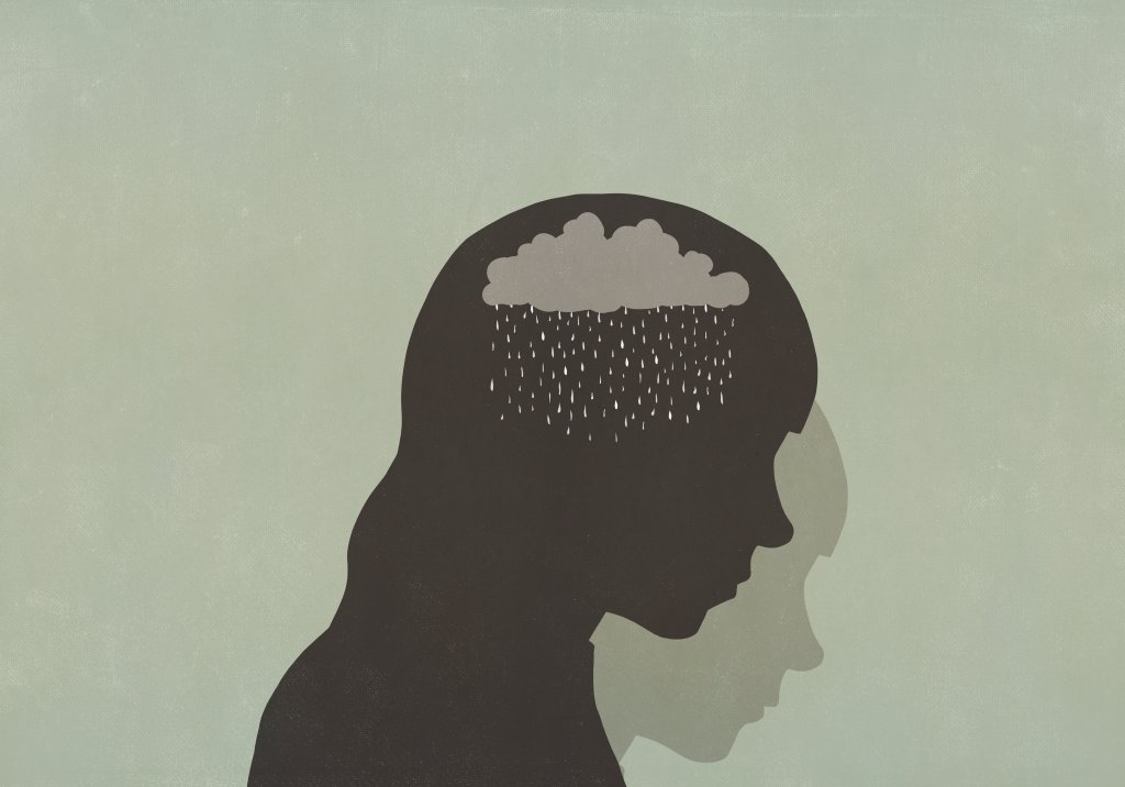 Ilustração da silhueta de uma mulher. Dentro da cabeça, no lugar do cérebro, uma nuvem cinzenta e chuvosa