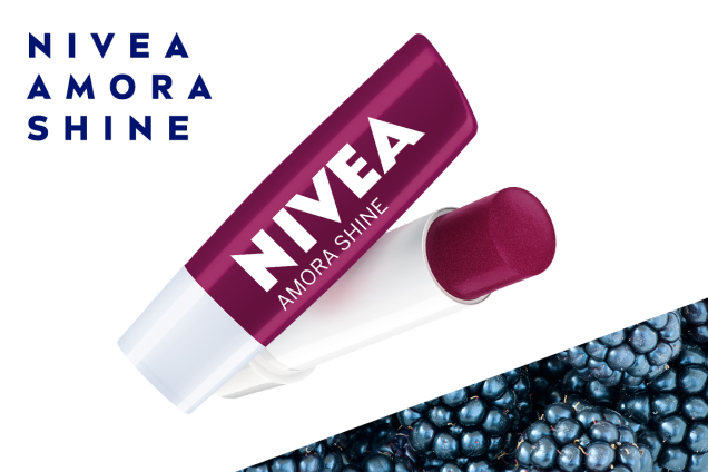 NIVEA Amora Shine: O hidratante labial roxinho faz parte da coleção que promete variações de cores, brilho suave, tons delicados e, claro, um aroma inesquecível. NIVEA Amora Shine: O hidratante labial roxinho faz parte da coleção que promete variações de cores, brilho suave, tons delicados e, claro, um aroma inesquecível.