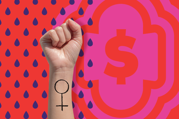 A woman hand and feminist sign tattoos on her hand isolate on pink background