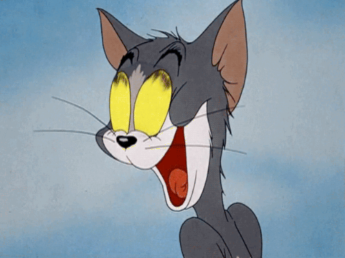 O Tom, do desenho Tom & Jerry, olhando apaixonado com olhos enormes e colocando a língua para fora, tipo babando pela gatinha