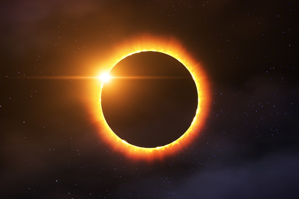 Imagem de um eclipse solar, com o Sol sendo encoberto pela Lua
