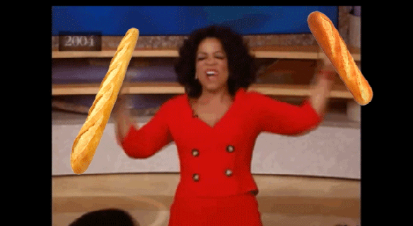 Gif da Oprah Winfrey gritando de alegria segurando duas baguetes
