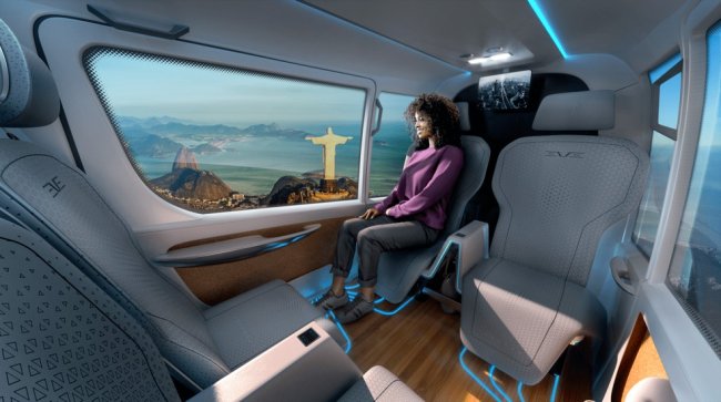 Carro voador elétrico será testado no Brasil neste mês Passageira sentada em poltrona de carro voador