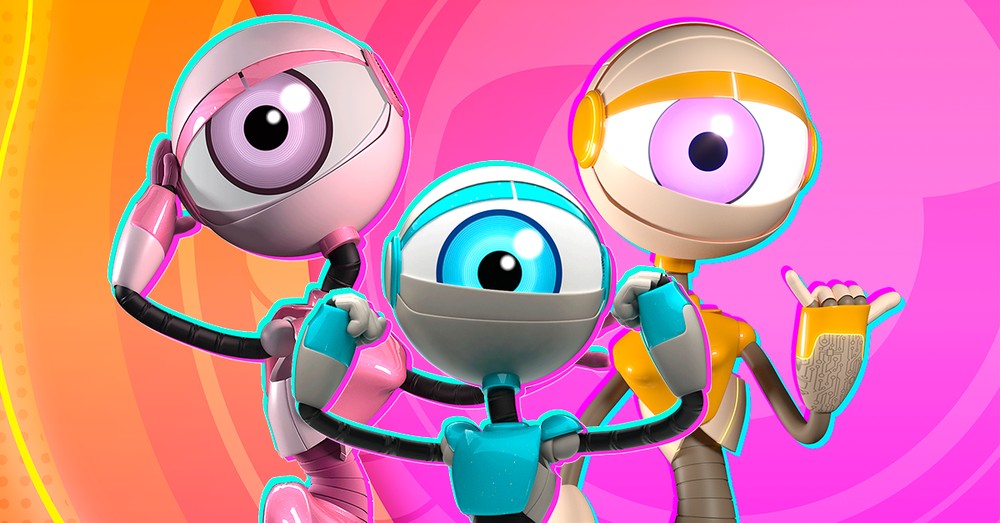 Foto de três robôs com um olho do BBB22; da esquerda para direta vemos eles nas cores rosa, azul e laranja em um fundo em tons de rosa