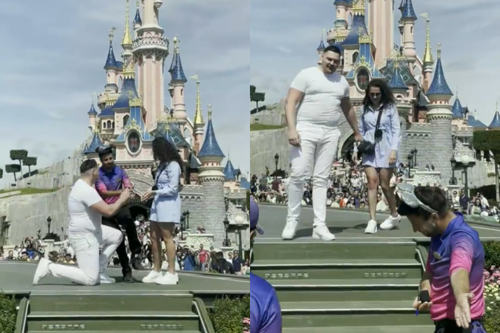 Funcuinário interrompendo pedido de casamento feito em frente ao Castelo da Bela Adormecida, na Disney Paris