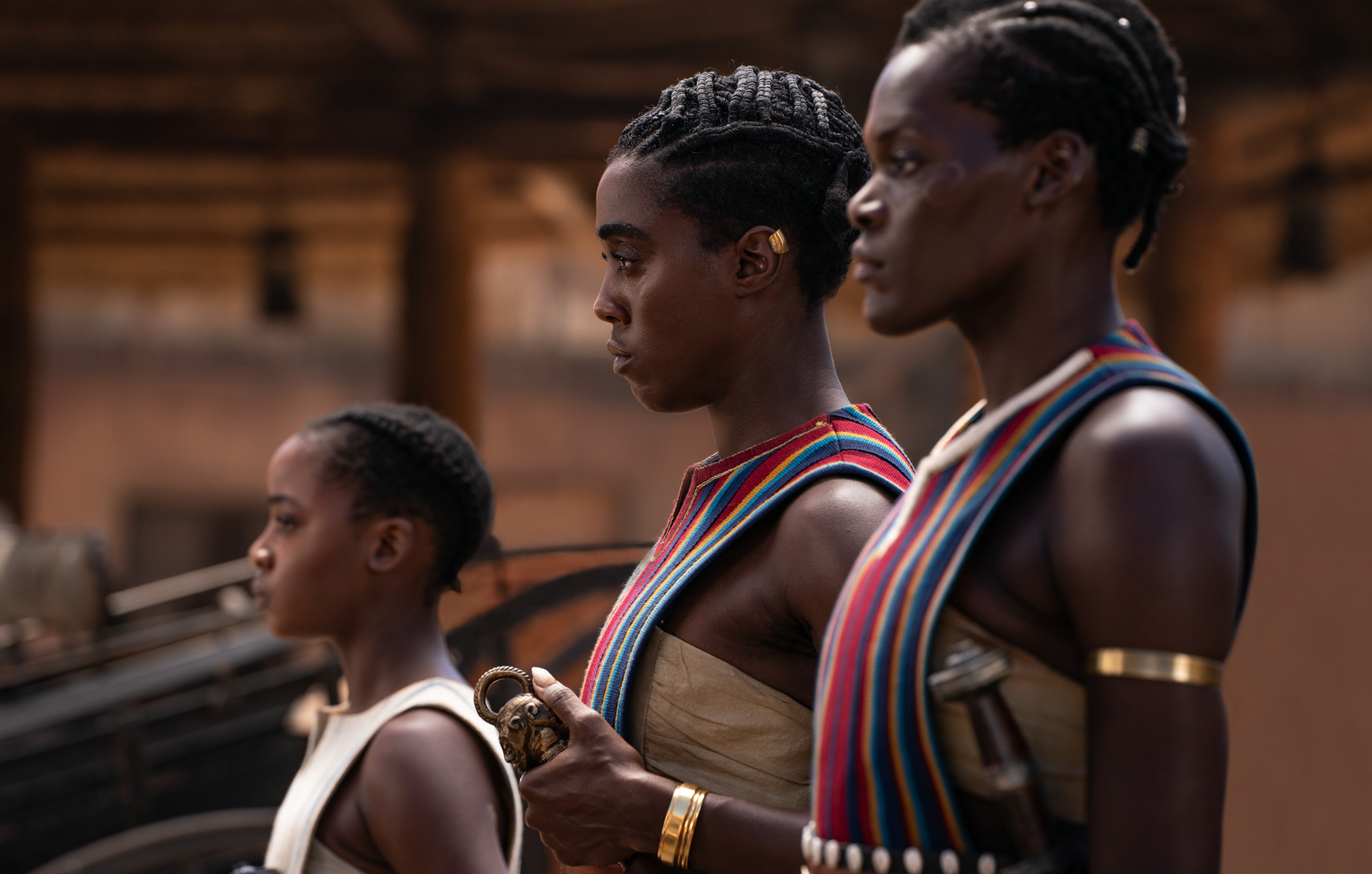 Image shows, from left to right, Thuso Mbedu as Nawi, Lashana Lynch as Izogie and Shelia Atim as Amenza.