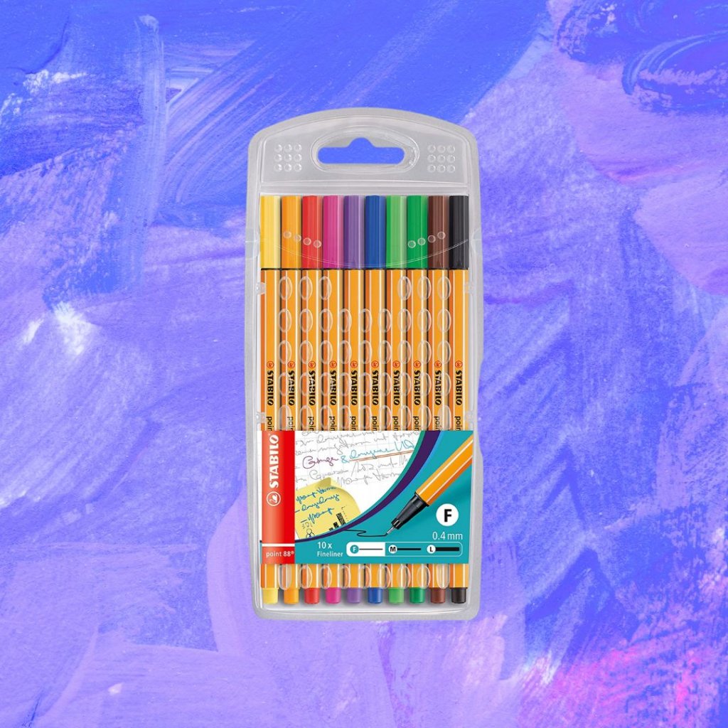 Imagem de um kit de canetas coloridas em um fundo em tons de roxo, lilás, rosa e branco