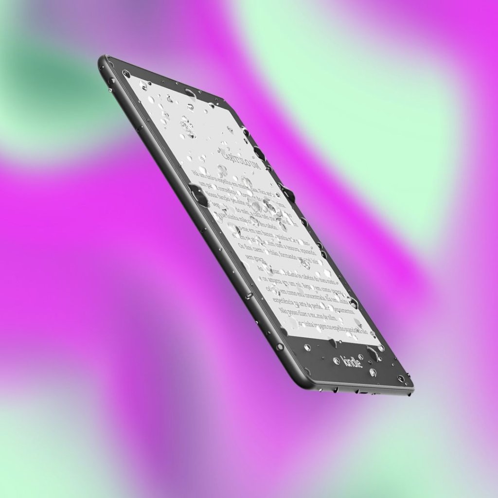 Imagem de um Kindle com a tela acesa e com gostas de água; o fundo é uma textura nas cores verde e lilás