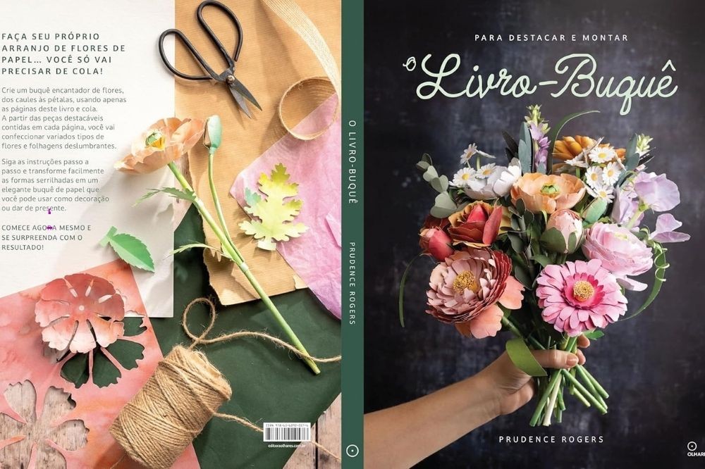 Capa e contracapa do livro "O Livro-Buquê" de Prudence Rogers. A capa mostra uma mão segurando um buquê de flores de papel coloridas, como margaridas, peônias e ranúnculos, em fundo escuro. A contracapa exibe materiais para artesanato: tesoura, carretel de barbante, folhas de papel e uma flor de papel em processo de montagem, com texto sobre como criar arranjos de flores de papel