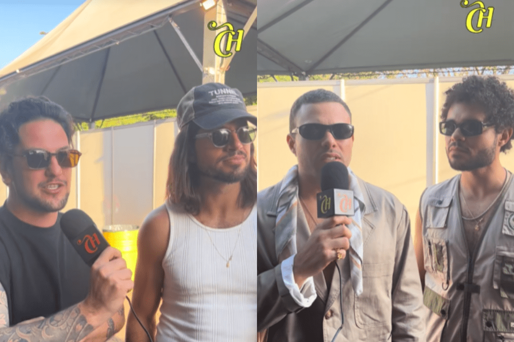 Quatro homens, todos de óculos escuros, são entrevistados em dois painéis. No painel esquerdo, um homem com tatuagens no braço segura um microfone e sorri para um homem de cabelo comprido, boné e regata branca. No painel direito, um homem com camisa bege e lenço no pescoço fala ao microfone, enquanto outro homem de cabelo crespo e colete utilitário o observa. O fundo é um cenário de evento com tendas e paredes claras