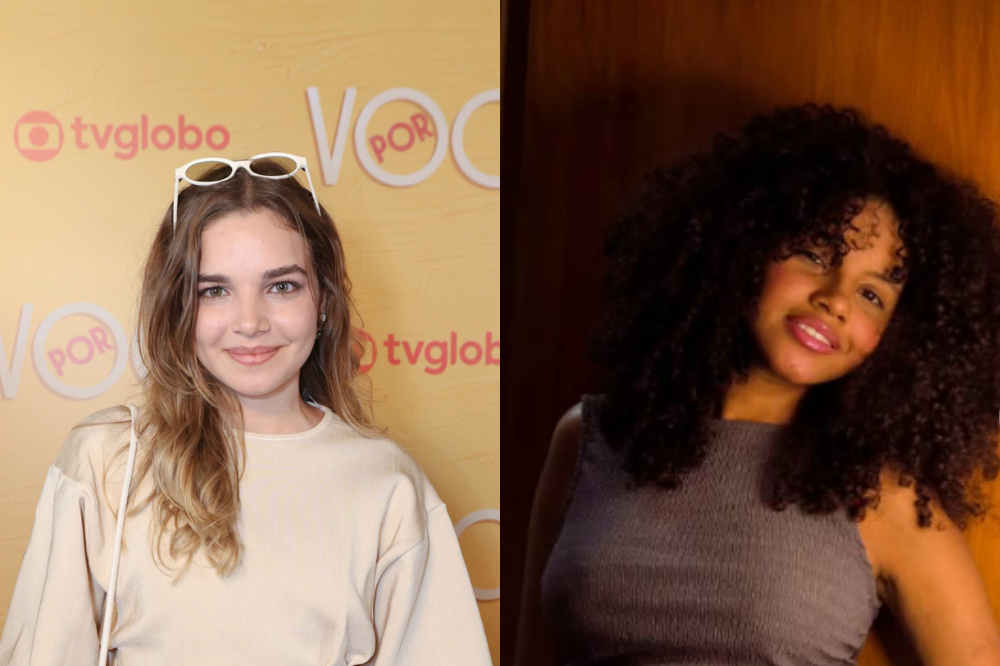 Duas mulheres: à esquerda, jovem branca de cabelos castanhos claros e óculos brancos na cabeça, sorri em frente a um fundo amarelo com o logo da TV Globo; à direita, jovem negra de cabelos crespos volumosos, sorri levemente inclinada, em um fundo escuro