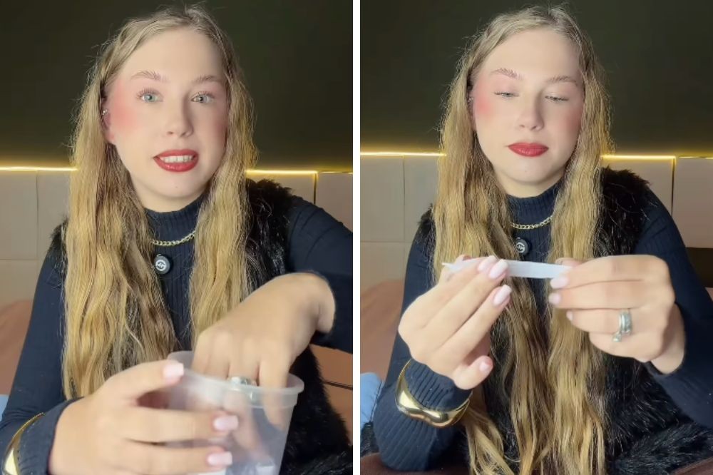 Mulher loira com maquiagem e blusa preta, em dois momentos: à esquerda, ela sorri enquanto tira algo de um copo transparente; à direita, ela segura uma tira de papel branco com as duas mãos, olhando para baixo